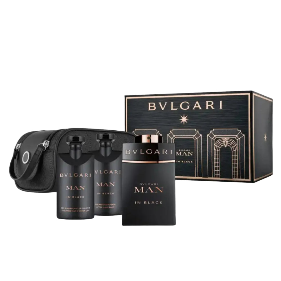 Bvlgari Man In Black fragrance gift set featuring a black box, two cylindrical bottles, and a black pouch, all with gold lettering, set against a clean white background.