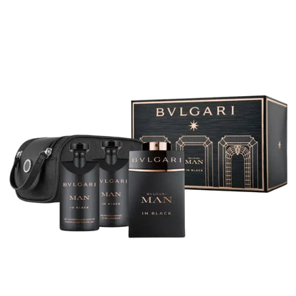 Bvlgari Man In Black fragrance gift set featuring a black box, two cylindrical bottles, and a black pouch, all with gold lettering, set against a clean white background.