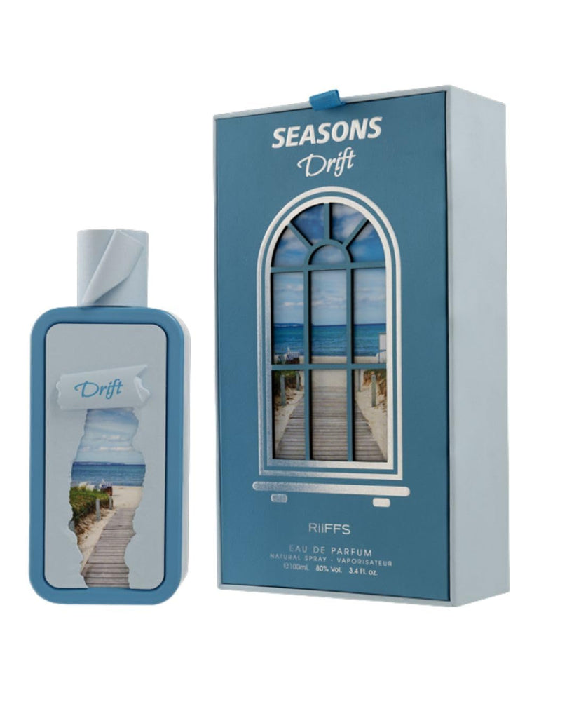 Riiffs Season Drift Eau de Parfum for women bottle sitting next to its elegant product packaging box on a crisp white background
